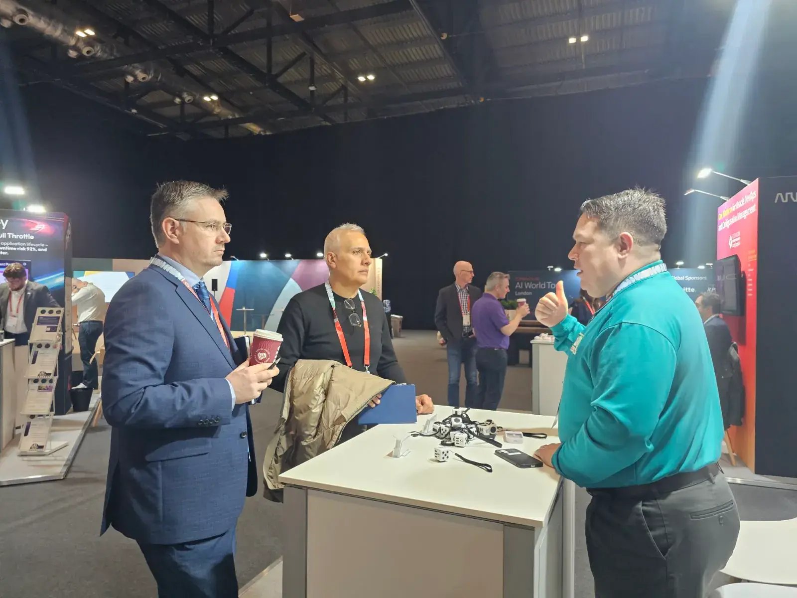 RChilli team in conversation with visitors at the booth